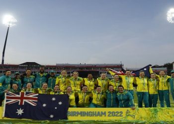 Gold medallists Australia celebrate on the podium during the medal ceremony.