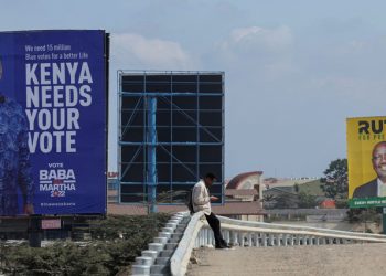 Banners of Kenya's opposition leader and presidential candidate Raila Odinga of the Azimio la Umoja (Declaration of Unity) coalition(R), and Kenya's Deputy President William Ruto and presidential candidate for the United Democratic Alliance (UDA) and Kenya Kwanza political coalition, are seen at the road side in Nairobi, Kenya, July 25, 2022.