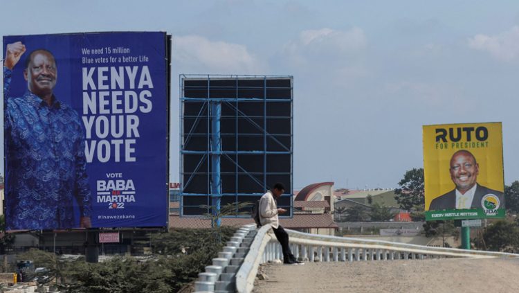 Banners of Kenya's opposition leader and presidential candidate Raila Odinga of the Azimio la Umoja (Declaration of Unity) coalition(R), and Kenya's Deputy President William Ruto and presidential candidate for the United Democratic Alliance (UDA) and Kenya Kwanza political coalition, are seen at the road side in Nairobi, Kenya, July 25, 2022.