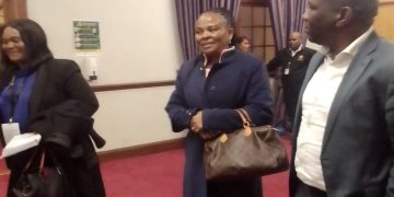Suspended Public Protector Busisiwe Mkhwebane (centre) outside Committee Room M46 where the Section 194 Parliamentary Committee is investigating her fitness to hold office, captured on 15 July 2022