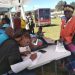 Residents of Pretoria are assisted in applying for the set top box.