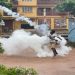 A demonstrator throws a gas canister during an anti-government protest, in Freetown, Sierra Leone, August 10, 2022