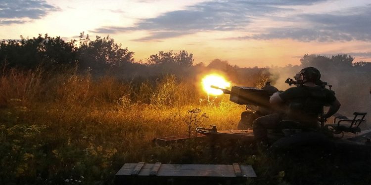 A Ukrainian serviceman fires with a ZU-23-2 anti-aircraft cannon at a position near a front line in the Kharkiv region, as Russia's attack on Ukraine continues, Ukraine August 10, 2022.