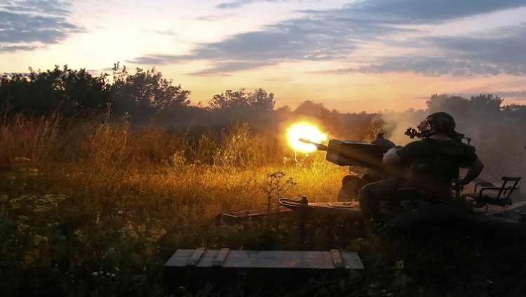 A Ukrainian serviceman fires with a ZU-23-2 anti-aircraft cannon at a position near a front line in the Kharkiv region, as Russia's attack on Ukraine continues, Ukraine August 10, 2022.