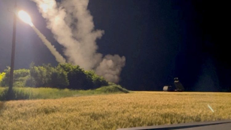 A view shows a M142 High Mobility Artillery Rocket System (HIMARS) is being fired in an undisclosed location, in Ukraine in this still image obtained from an undated social media video uploaded on June 24, 2022.