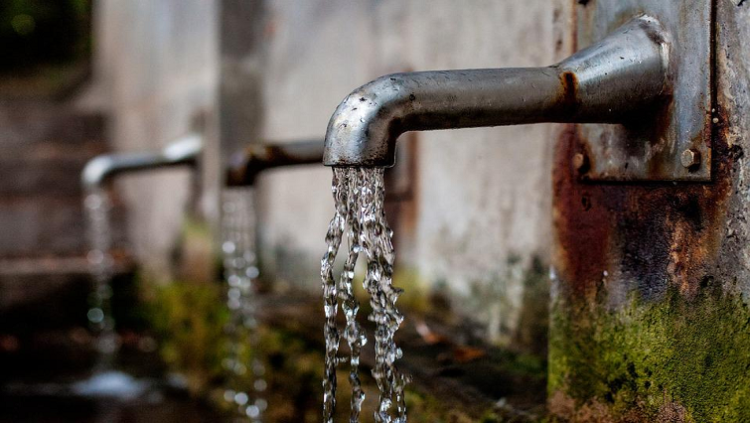 [File image]: Water flowing from taps.
