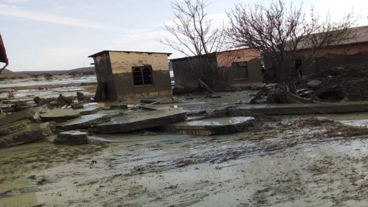 Damage houses and infrastructure in Jagersfontein following mine dam bursting.