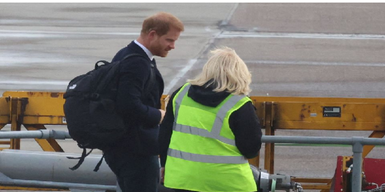 Britain's Prince Harry boards a plane at Aberdeen International Airport, following the passing of Britain's Queen Elizabeth, in Aberdeen, Britain, September 9, 2022.