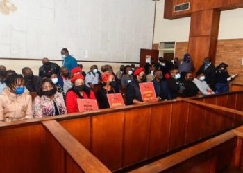 File Photo: Members of the EFF with posters and Hillary Gardee’s family (front row) are seen inside the Nelspruit Magistrates’ Court in Mbombela on 09 May 2022.
