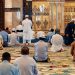 Muslim men pray inside a Mosque