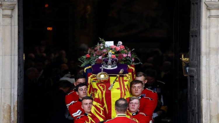 The coffin of UK's Queen Elizabeth is carried out of Westminster Abbey after the service