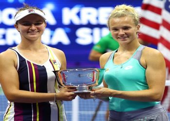Czech Republic's Katerina Siniakova and Barbora Krejcikova celebrate with the trophy after winning the women's doubles final against Caty McNally and Taylor Townsend of the US.