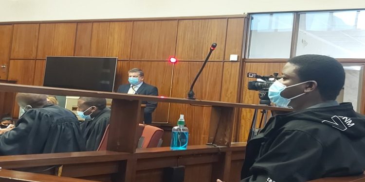 (File Image) 31-year-old Fees Must Fall activist Bonginkosi Khanyile sitting in court.