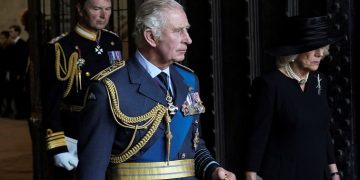 Britain's King Charles III, Camilla, the Queen Consort, right