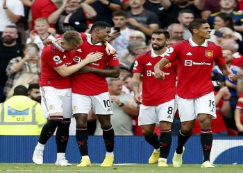 Manchester United's Marcus Rashford celebrates scoring their third goal with Scott McTominay, Bruno Fernandes and Raphael Varane.