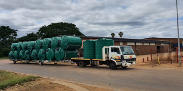 [FILE IMAGE] A truck transporting water tanks.