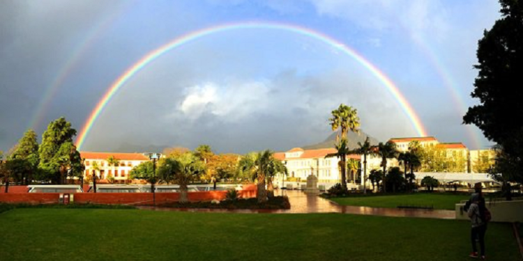 Rainbows arch over he grounds of Stellenbosch University
