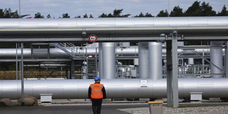 File Photo: Security walks in front of the landfall facility of the Baltic Sea gas pipeline Nord Stream 2 in Lubmin, Germany, September 19, 2022.