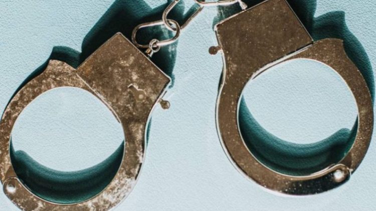 A pair of police handcuffs
