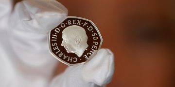 The official coin effigy of Britain’s King Charles III is seen on a 50 pence coin, unveiled by The Royal Mint, in London, Britain, September 29, 2022.