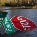 A street sign lies in flood waters after Hurricane Ian made landfall in southwestern Florida, in Punta Gorda, Florida, US, September 29, 2022.