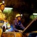 Mineworkers seen inside a shaft