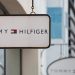 Boards with Tommy Hilfiger store logo are seen on a shopping center at the outlet village Belaya Dacha outside Moscow, Russia, April 23, 2016.