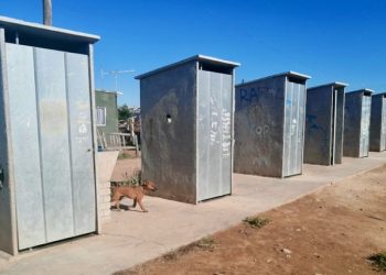 Bucket toilets seen lined up in an informal settlement