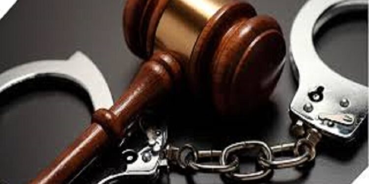 Image of a court gavel and handcuffs