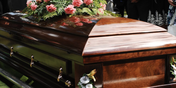 [File photo] A wooden coffin in seen in the image above