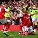 Arsenal's Granit Xhaka celebrates scoring their third goal with Fabio Vieira and Gabriel Martinelli.