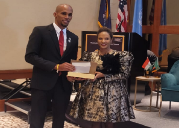 SABC's Full View Executive Producer Megan Lubke receives her award at the Influential People of African Descent Global Recognition awards in New York.