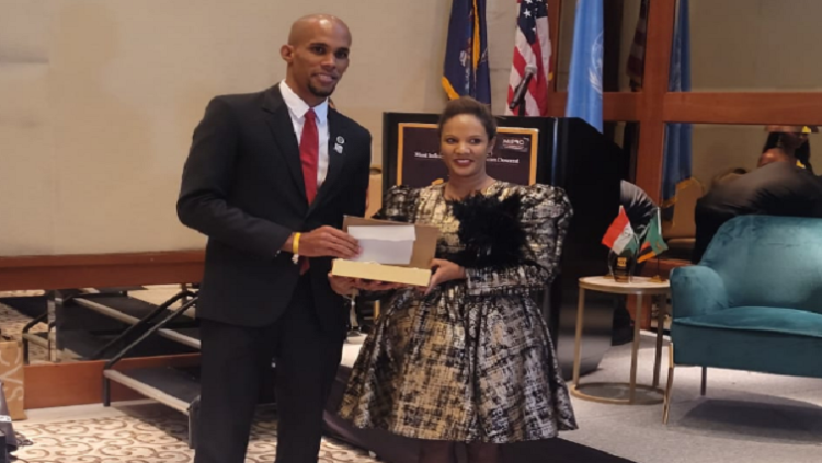 SABC's Full View Executive Producer Megan Lubke receives her award at the Influential People of African Descent Global Recognition awards in New York.