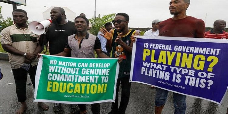 Members of the National Association of Nigerian Students (NANS) staged a protest against prolonged strike action of the Academic Staff Union of Universities at the access road to the Murtala Muhammad International Airport in Lagos, Nigeria September 19, 2022.