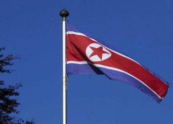 [File Image]: A North Korean flag flies on a mast at the Permanent Mission of North Korea in Geneva October 2, 2014.