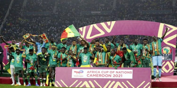 Senegal players celebrate after winning the Africa Cup of Nations, February 6, 2022.