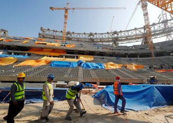 File Photo: Workers are seen inside the Lusail stadium which is under construction for the upcoming 2022 Fifa soccer World Cup during a stadium tour in Doha, Qatar, December 20, 2019