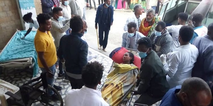 A woman is taken to Ayder Referral Hospital, in Mekelle, after an airstrike in Togoga, Ethiopia's Tigray region June 22, 2021. Picture taken June 22, 2021. Tigray Guardians 24 via REUTERS