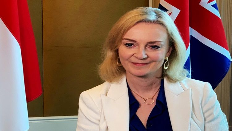 FILE PHOTO: British trade minister Liz Truss speaks to Reuters after signing a free trade agreement with Singapore, in Singapore, December 10, 2020.  REUTERS/Pedja Stanisic