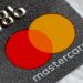 A Mastercard logo is seen on a credit card in this picture illustration.