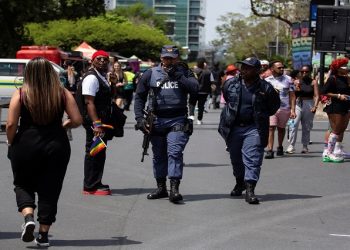 South African police officers patrol the Johannesburg Pride celebration which proceeded despite the reported threat of a terror attack in Sandton, Johannesburg, South Africa October 29, 2022. REUTERS/James Oatway