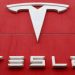 The logo of car manufacturer Tesla is seen at a branch office.