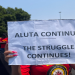 One of the Satawu members holds a placard during a strike in Johannesburg