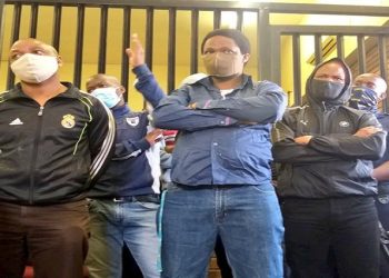 Suspects in the Senzo Meyiwa murder case in court surrounded by police officers