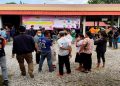 People gather outside a daycare centre, the scene of a mass shooting in the town of Uthai Sawan, 500 km (310 miles) northeast of Bangkok in the province of Nong Bua Lamphu, Thailand October 6, 2022.