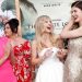 Cast members Molly Shannon, Sydney Sweeney, and Alexandra Daddario laugh as they attend a premiere for the limited series The White Lotus at Bel-Air Bay Club in Pacific Palisades, Los Angeles, California July 7, 2021