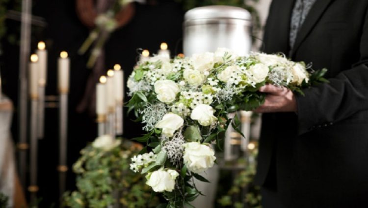 Flowers with candles in the background