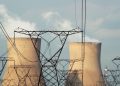 Cooling towers are pictured at a coal-based power station owned by state power utility Eskom in Duhva, South Africa, February 18, 2020