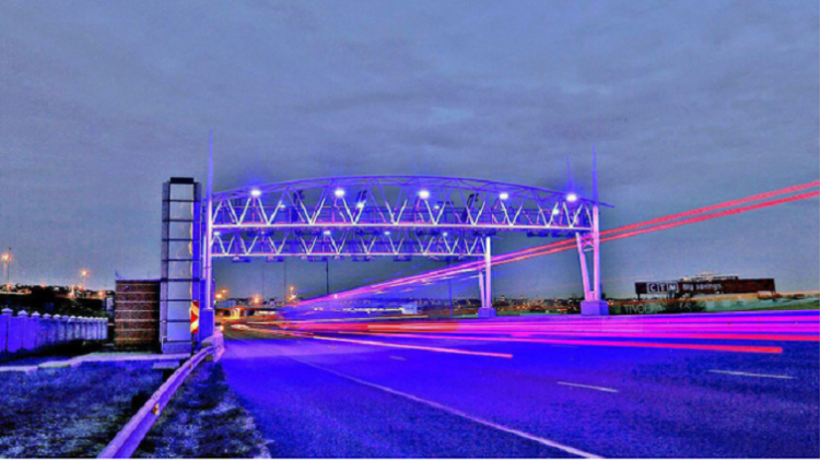 A night view of an e-toll gantry on one of Gauteng's highways.