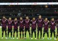 File | Mexico line up during the national anthems before the match against El Salvador